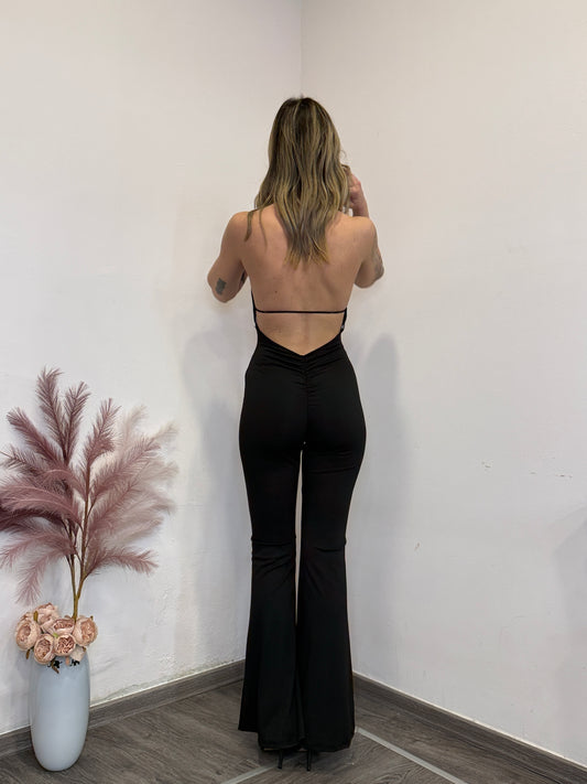 Tuta schiena nuda gamba zampa