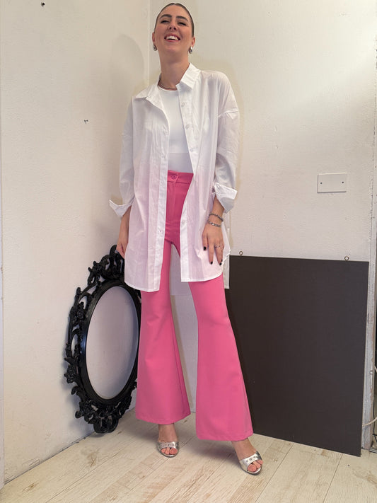 Pantaloni zampa fucsia