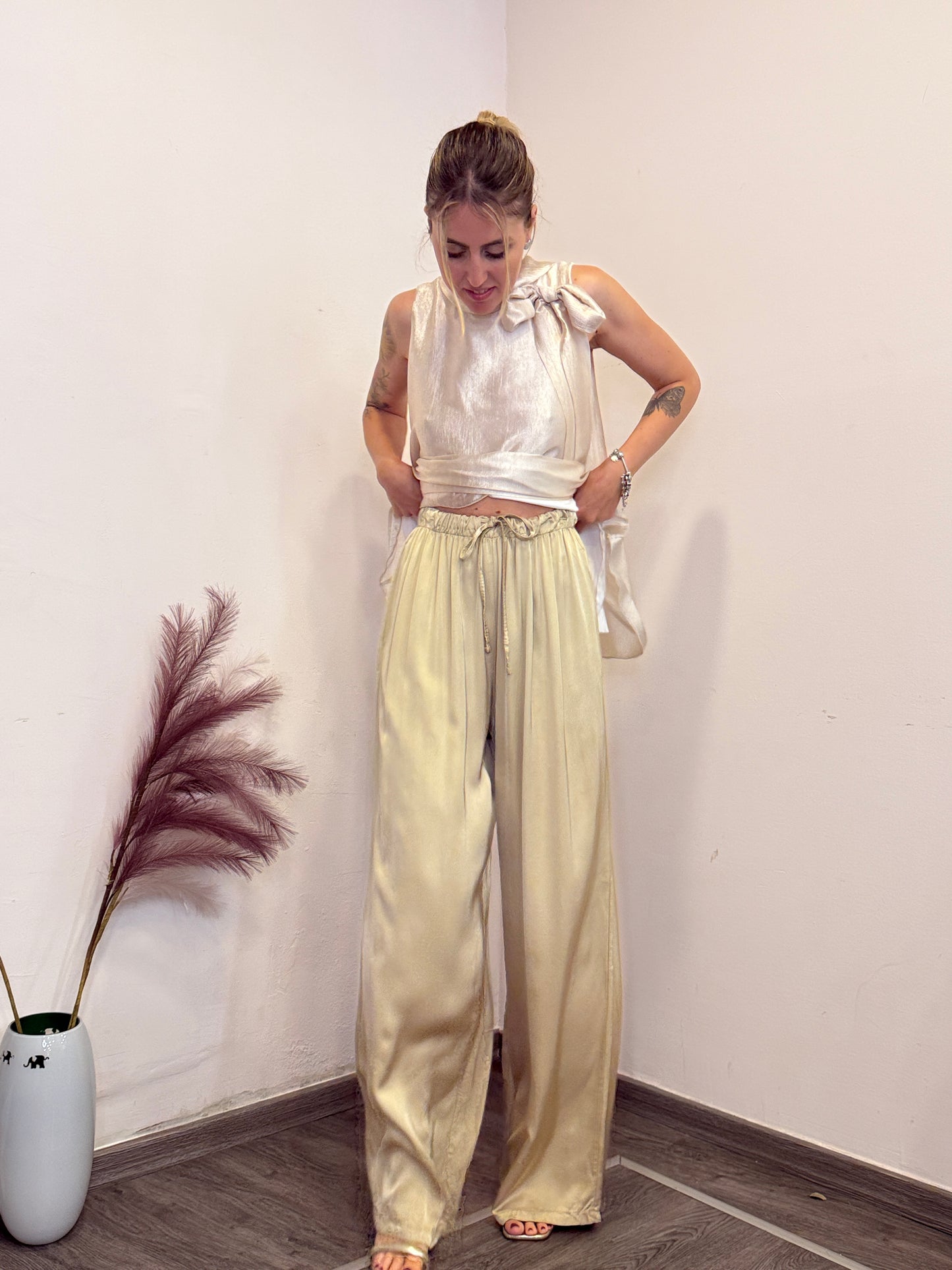 Pantaloni palazzo raso oro