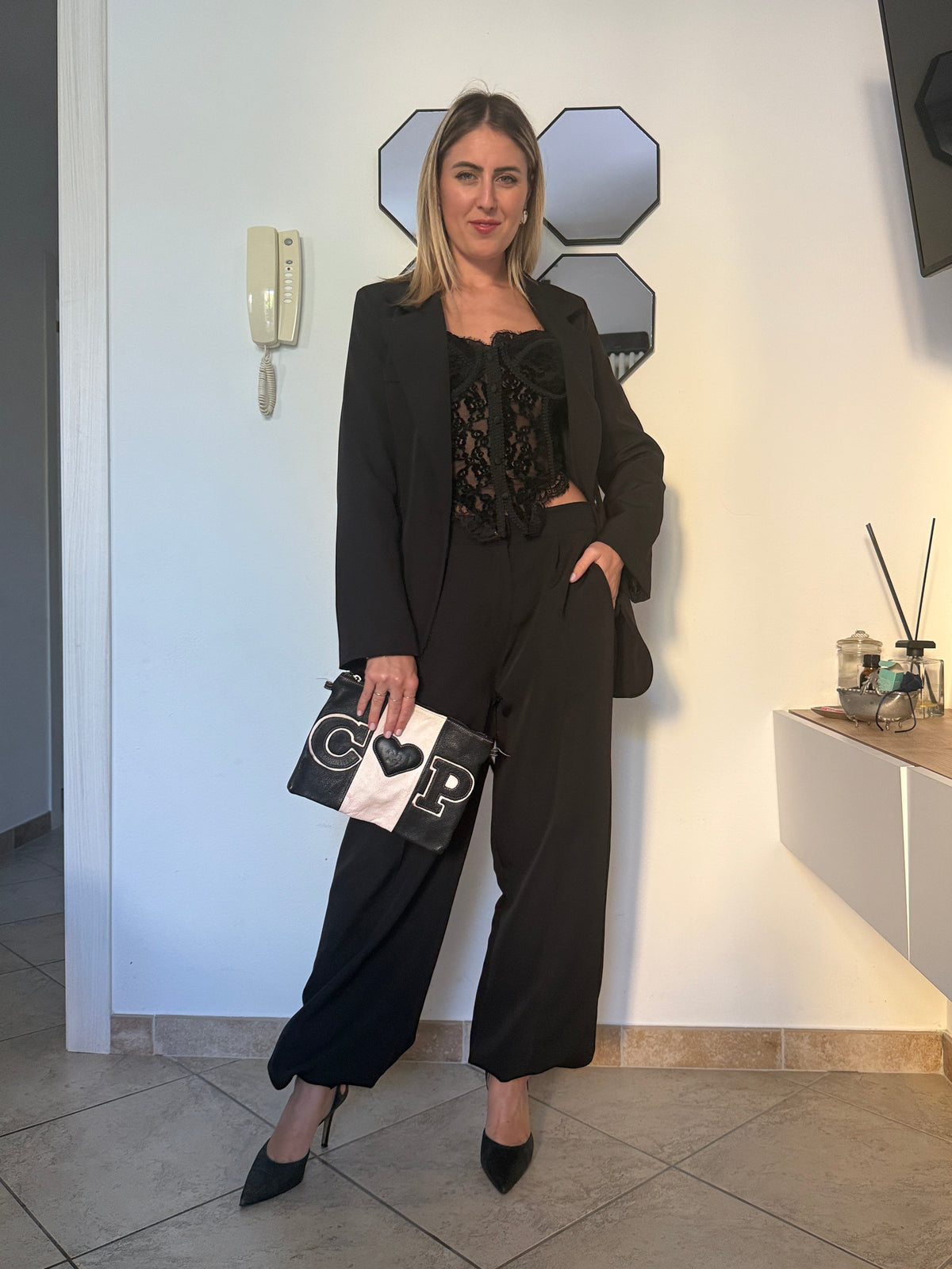 Completo black con pantaloni palazzo