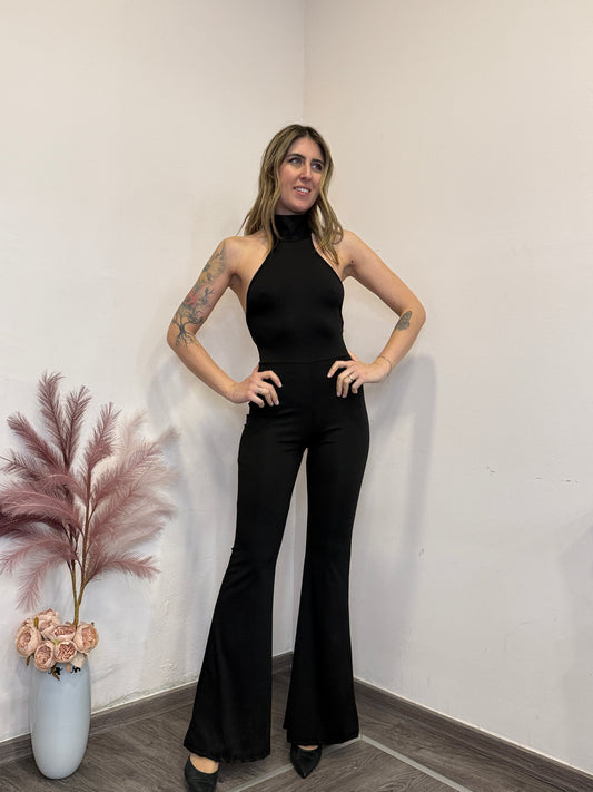 Tuta schiena nuda gamba zampa