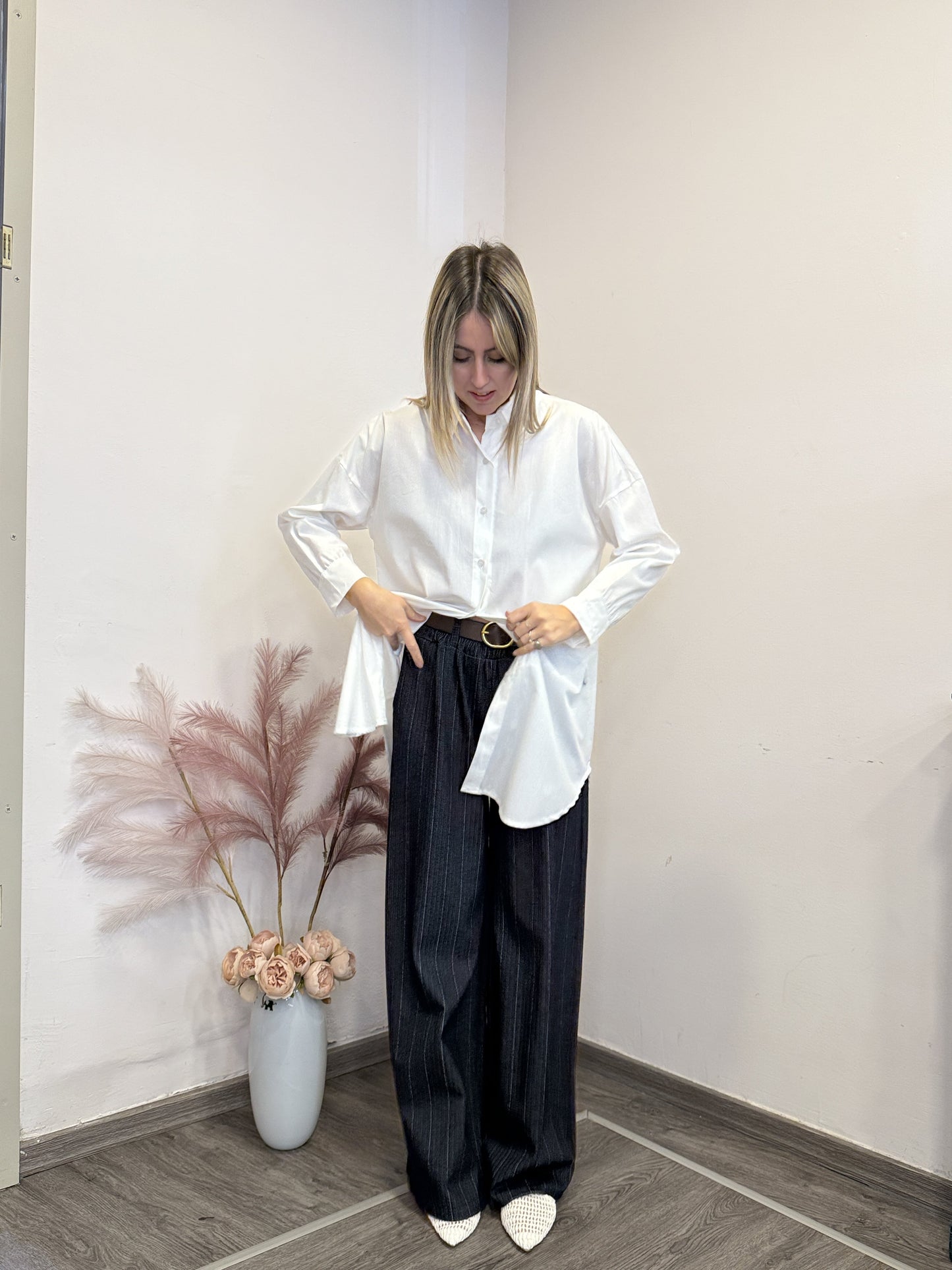 Pantaloni gessati palazzo