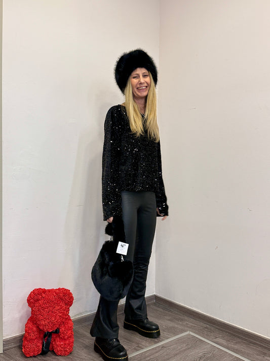 Pantaloni ecopelle a zampa