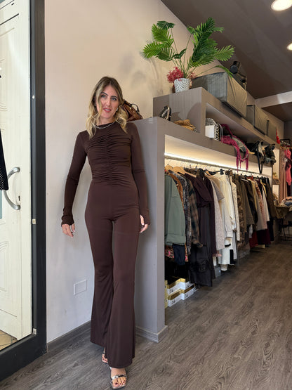 Tuta arricciata con schiena nuda
